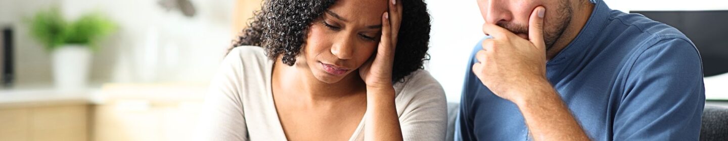 Concerned Couple Reading IRS Notice CP45