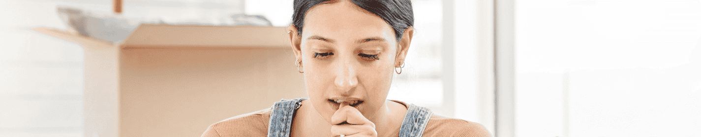 Concerned Woman Reading her CP05 Notice