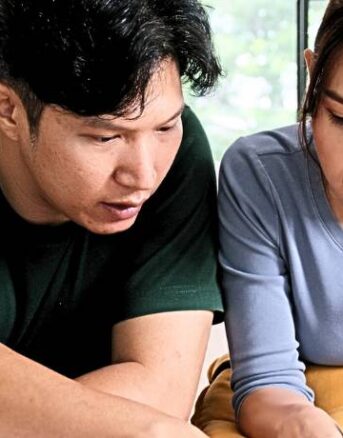 Couple Comparing How Much Tax Attorneys Cost