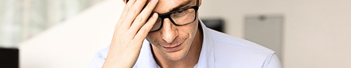 Man Anxiously Reading IRS Notice CP081B