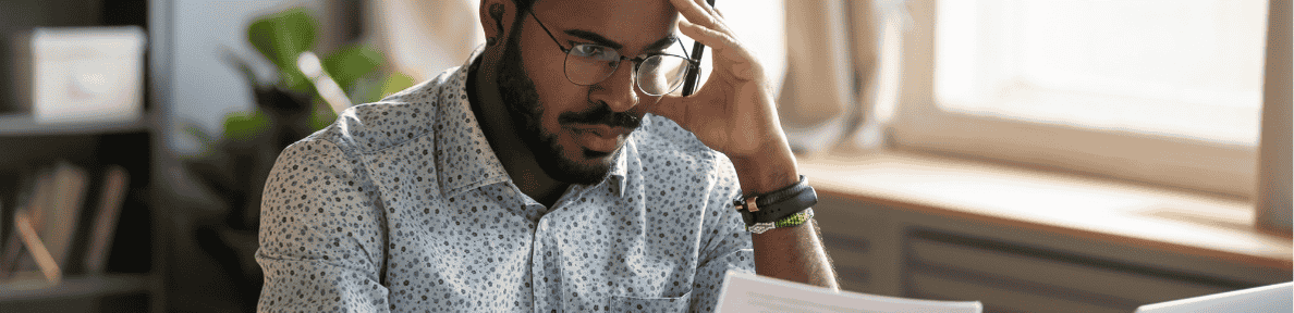 Man Studying His CP63 Notice