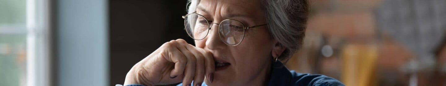 Older Woman Worried After Reading Her IRS Notice CP14