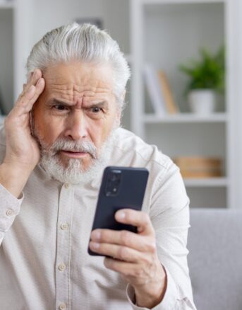 Senior man worried about an unknown IRS phone number calling him
