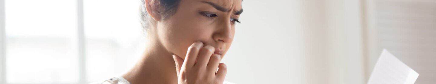 Woman Anxious After Reading Her IRS Notice CP60