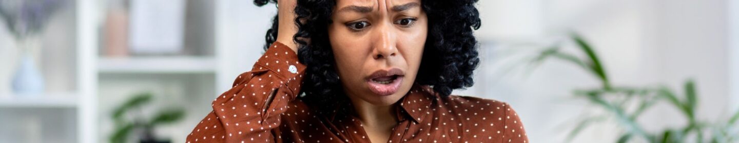 Woman Shocked While Reading IRS Notice CP92