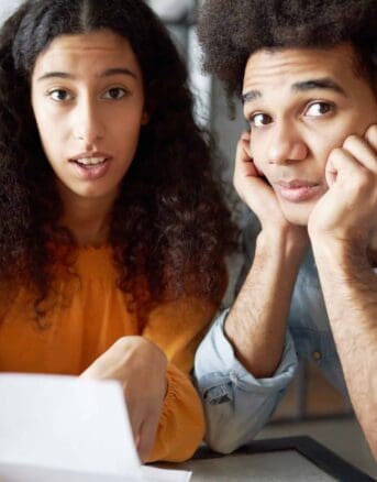 Young Couple Dismayed by IRS Notice CP14E